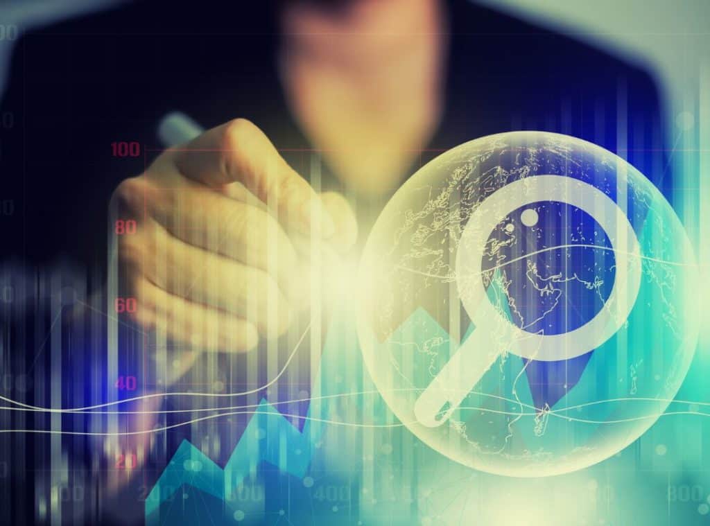 corma- A woman is holding a magnifying glass in front of a graph, providing Services for Businesses.